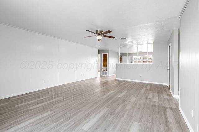 3302 Sequoia St, Amarillo, TX 79107 - unfurnished living room featuring ceiling fan and wood finished floors
