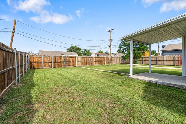 3302 Sequoia St, Amarillo, TX 79107 - fenced backyard with a patio area