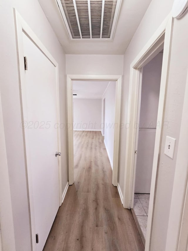4301 S Washington St, Amarillo, TX 79110 - hall featuring light wood-style floors and baseboards
