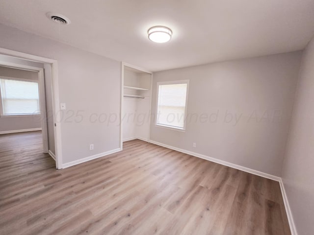 4301 S Washington St, Amarillo, TX 79110 - unfurnished bedroom featuring wood finished floors and a closet
