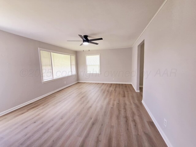 4301 S Washington St, Amarillo, TX 79110 - unfurnished room with ceiling fan and wood finished floors