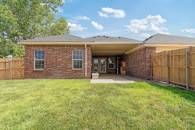 9317 Shylana Ave, Amarillo, TX 79119 - back of property with brick siding, a fenced backyard, a patio, and a shingled roof