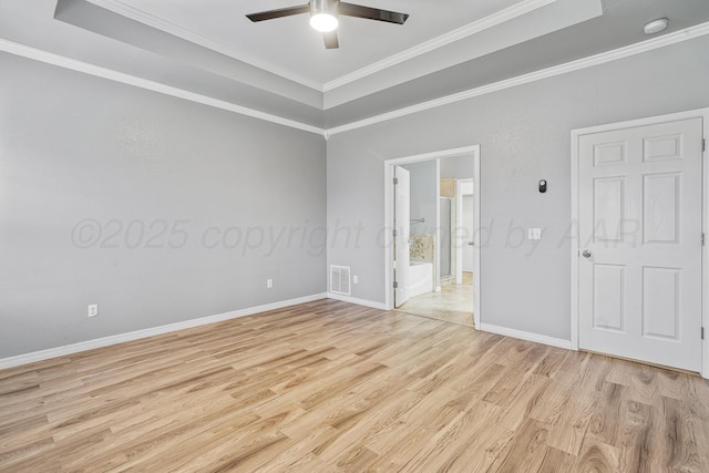 9317 Shylana Ave, Amarillo, TX 79119 - unfurnished room with light wood-type flooring, a ceiling fan, a tray ceiling, ornamental molding, and a smoke detector