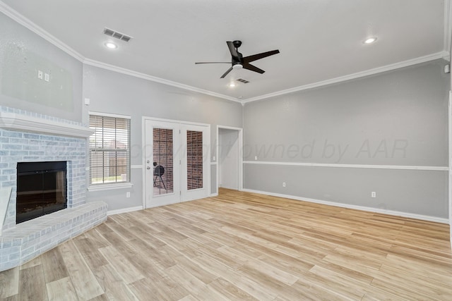 9317 Shylana Ave, Amarillo, TX 79119 - unfurnished living room featuring ceiling fan, ornamental molding, wood finished floors, a fireplace, and recessed lighting