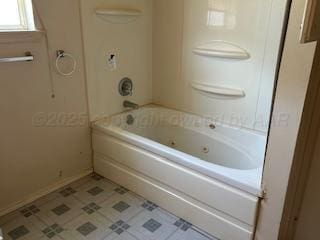 4512 Lehigh St, Lubbock, TX 79416 - bathroom featuring baseboards and bathing tub / shower combination