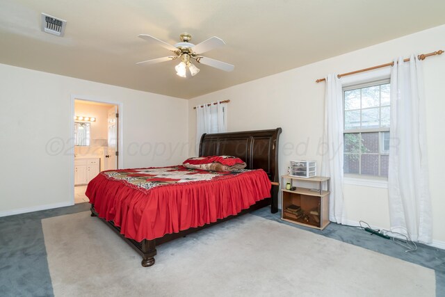 3519 S Julian Blvd, Amarillo, TX 79102 - carpeted bedroom with baseboards, a ceiling fan, connected bathroom, and visible vents