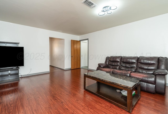 3519 S Julian Blvd, Amarillo, TX 79102 - living area featuring visible vents, baseboards, and wood finished floors