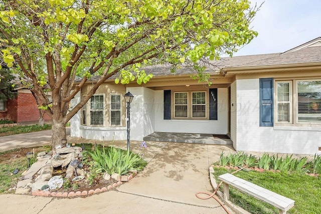 3519 S Julian Blvd, Amarillo, TX 79102 - doorway to property featuring a porch and brick siding