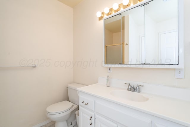 3519 S Julian Blvd, Amarillo, TX 79102 - bathroom with vanity, a shower with shower door, and toilet