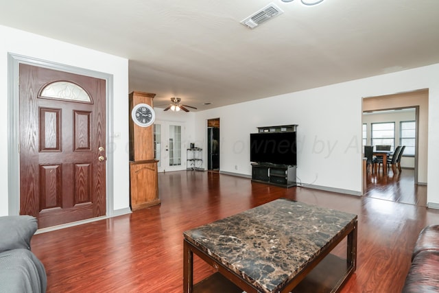 3519 S Julian Blvd, Amarillo, TX 79102 - living room with visible vents, dark wood-style flooring, ceiling fan, and baseboards