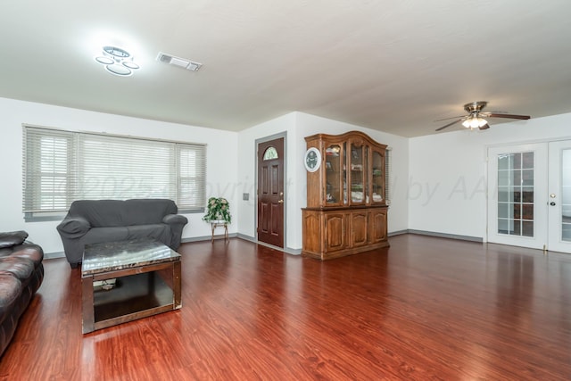 3519 S Julian Blvd, Amarillo, TX 79102 - living room featuring baseboards, a ceiling fan, wood finished floors, and visible vents