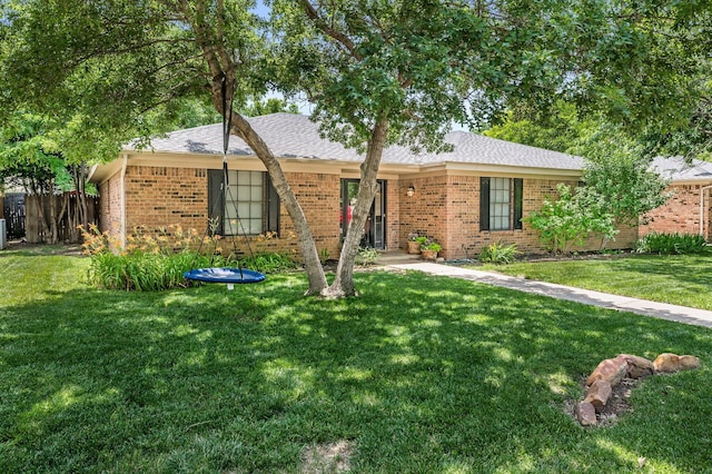 7703 Farrell Dr, Amarillo, TX 79121 - ranch-style house with brick siding and roof with shingles