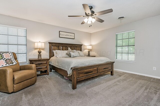 7703 Farrell Dr, Amarillo, TX 79121 - bedroom with carpet floors and ceiling fan