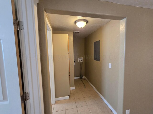 1313 Skyline Dr, Amarillo, TX 79108 - hall with electric panel and light tile patterned floors
