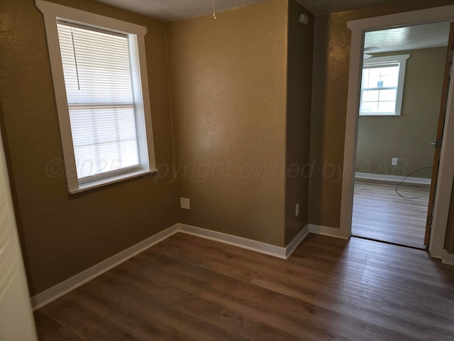 1313 Skyline Dr, Amarillo, TX 79108 - empty room featuring wood finished floors and baseboards