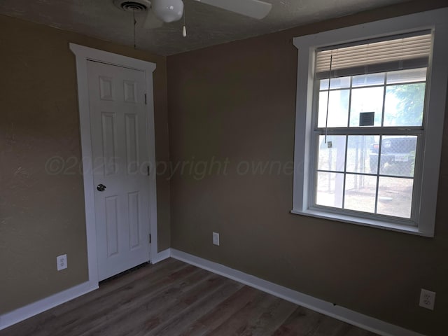 1313 Skyline Dr, Amarillo, TX 79108 - spare room featuring baseboards, wood finished floors, and a ceiling fan