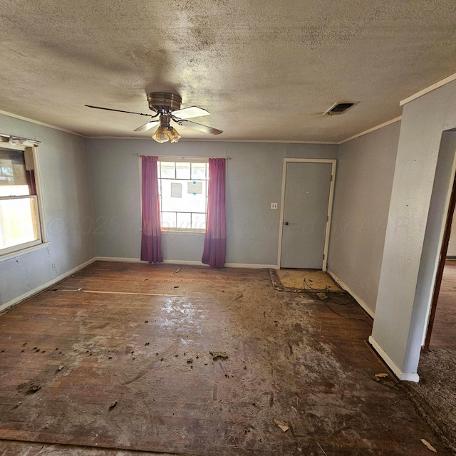 1206 Durrett Ave, Dumas, TX 79029 - empty room with a textured ceiling, crown molding, and a ceiling fan
