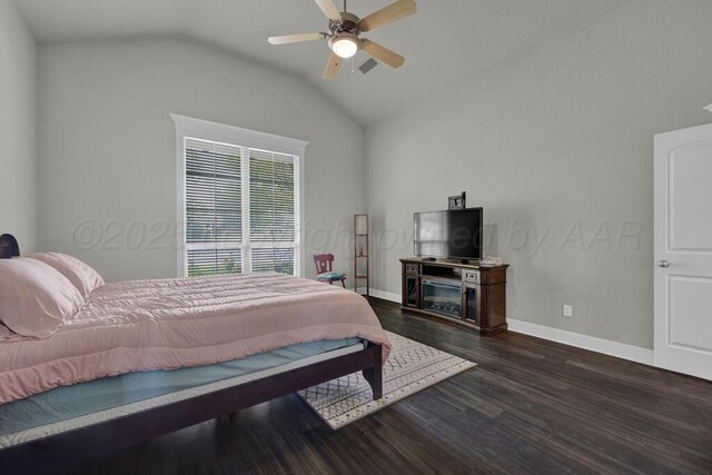 6414 Persimmon Ln, Amarillo, TX 79124 - bedroom with vaulted ceiling, wood finished floors, baseboards, and ceiling fan