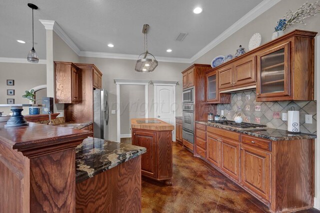 6414 Persimmon Ln, Amarillo, TX 79124 - kitchen featuring appliances with stainless steel finishes, a warming drawer, a kitchen island, a sink, and decorative backsplash