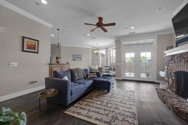 6414 Persimmon Ln, Amarillo, TX 79124 - living area featuring wood finished floors, ceiling fan, ornamental molding, baseboards, and a fireplace with raised hearth