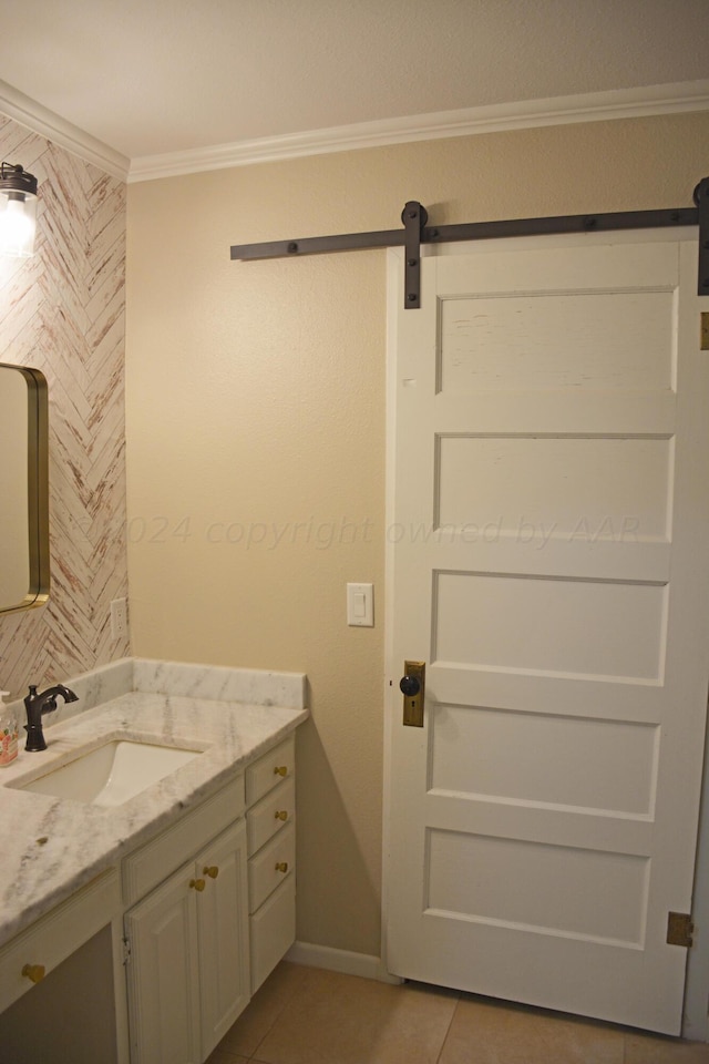 bathroom with vanity, tile patterned floors, and crown molding