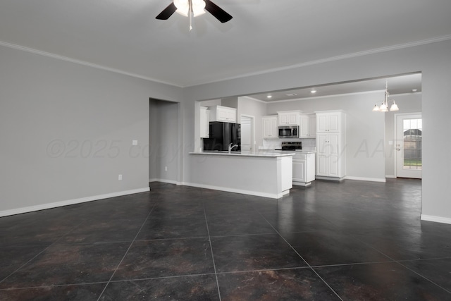 7602 Castleman Rd, Amarillo, TX 79119 - unfurnished living room with crown molding, ceiling fan, and a chandelier