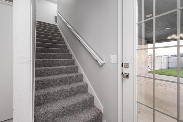 7602 Castleman Rd, Amarillo, TX 79119 - stairway featuring baseboards