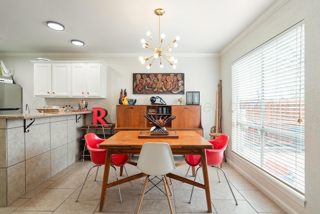 dining area featuring light tile patterned floors, a notable chandelier, and crown molding