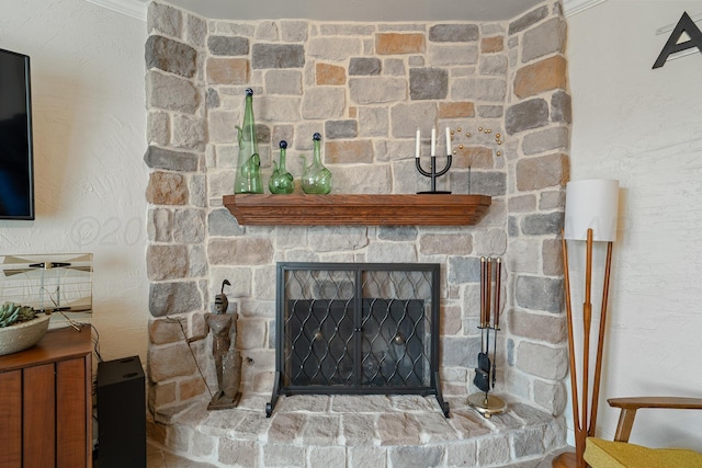 details with a stone fireplace