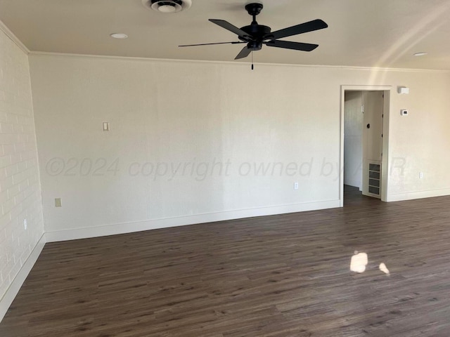 unfurnished room featuring dark hardwood / wood-style floors, ceiling fan, and ornamental molding