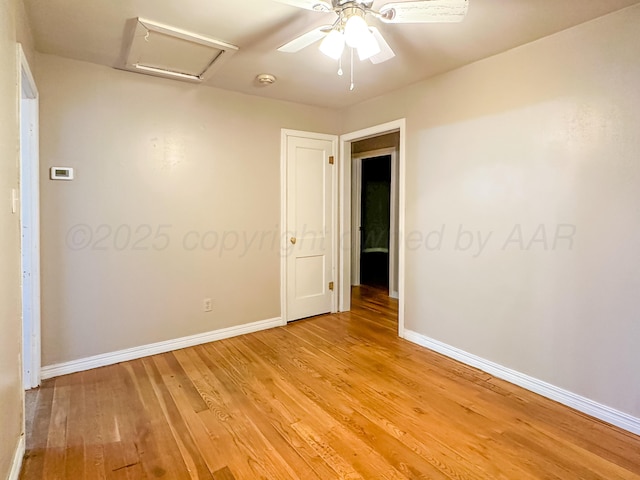 unfurnished room with light hardwood / wood-style floors and ceiling fan