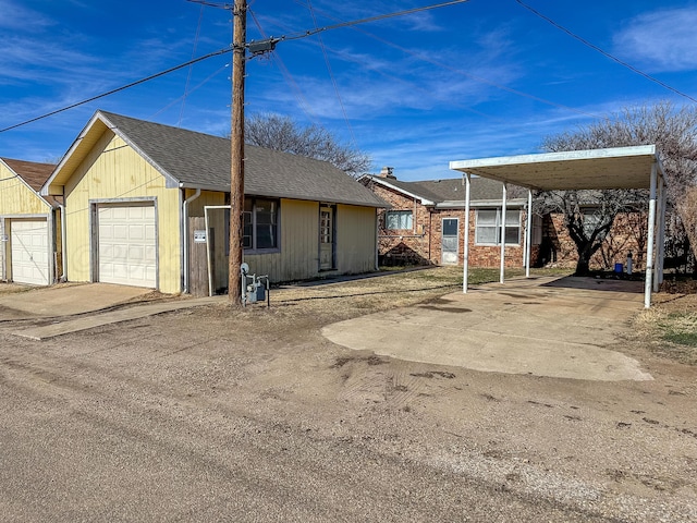 exterior space with a carport