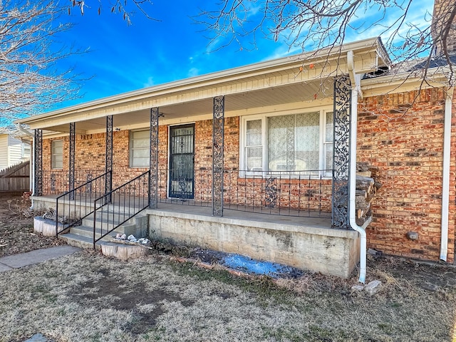 single story home featuring a porch