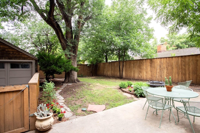 2402 S Hayden St, Amarillo, TX 79109 - fenced backyard featuring a patio area and outdoor dining area
