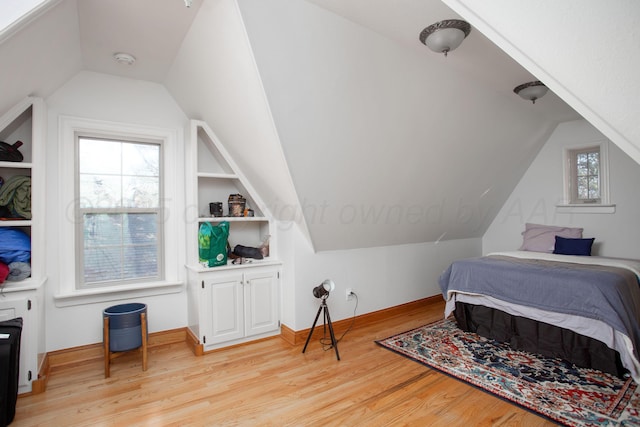 2402 S Hayden St, Amarillo, TX 79109 - bedroom featuring lofted ceiling and light wood-style flooring