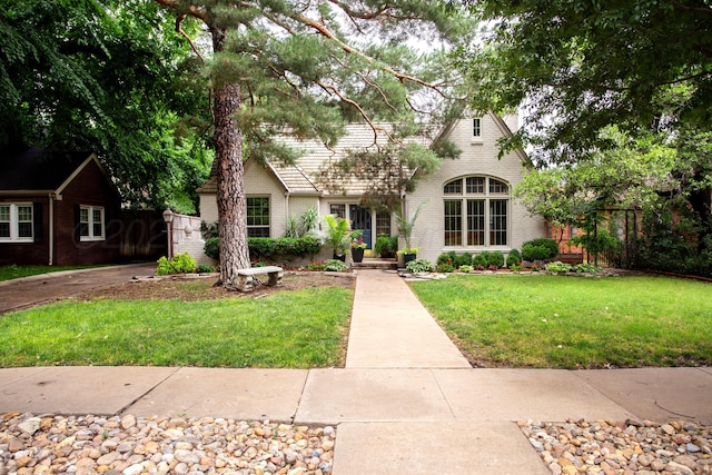 2402 S Hayden St, Amarillo, TX 79109 - view of front of house featuring brick siding and a front lawn