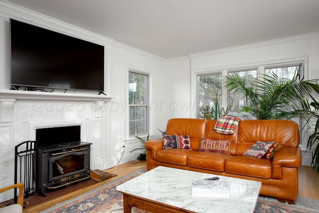 2402 S Hayden St, Amarillo, TX 79109 - living room featuring wood finished floors, ornamental molding, and a fireplace