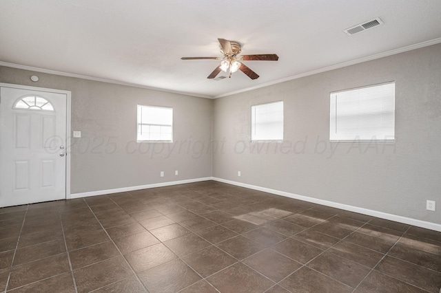 entryway featuring ceiling fan and crown molding