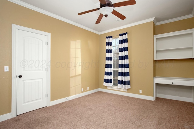 unfurnished bedroom featuring ornamental molding, carpet floors, and baseboards