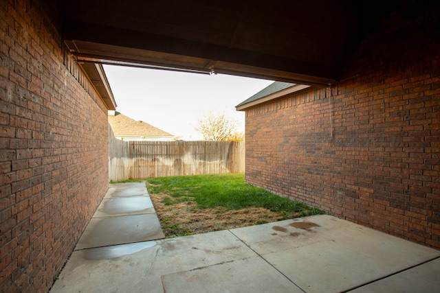 view of yard with a patio area and fence