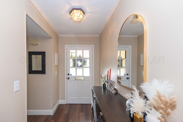1506 S Alabama St, Amarillo, TX 79102 - entrance foyer with dark wood-type flooring, arched walkways, crown molding, and baseboards