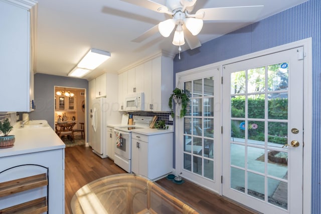 1506 S Alabama St, Amarillo, TX 79102 - kitchen with white appliances, dark wood-style flooring, light countertops, and white cabinetry