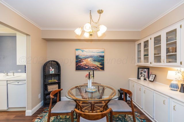 1506 S Alabama St, Amarillo, TX 79102 - dining space with a chandelier, dark wood-style floors, ornamental molding, and baseboards