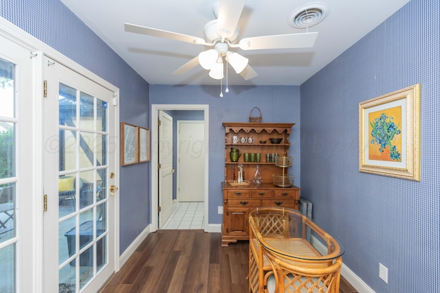 1506 S Alabama St, Amarillo, TX 79102 - dining room featuring dark wood-style floors, a ceiling fan, and baseboards