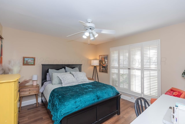 1506 S Alabama St, Amarillo, TX 79102 - bedroom with wood finished floors, a ceiling fan, and baseboards