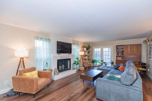 1506 S Alabama St, Amarillo, TX 79102 - living area featuring a fireplace, ornamental molding, wood finished floors, and baseboards