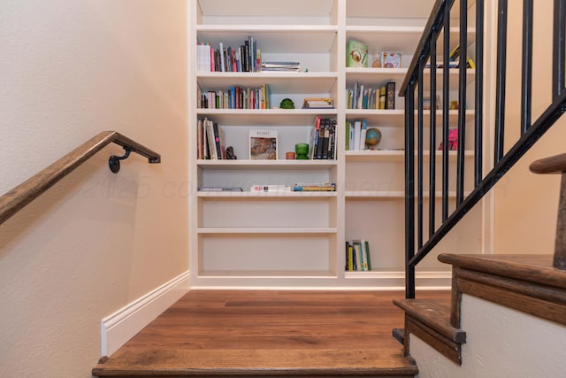 1506 S Alabama St, Amarillo, TX 79102 - staircase featuring wood finished floors, baseboards, and a textured wall