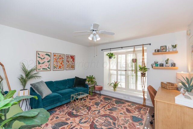 1506 S Alabama St, Amarillo, TX 79102 - living room with a ceiling fan, wood finished floors, and baseboards