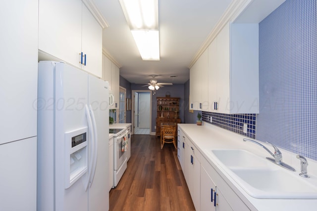 1506 S Alabama St, Amarillo, TX 79102 - kitchen with white appliances, a sink, dark wood-type flooring, light countertops, and ceiling fan