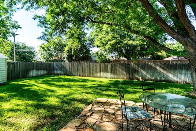7503 Elmhurst Dr, Amarillo, TX 79121 - fenced backyard featuring a patio area